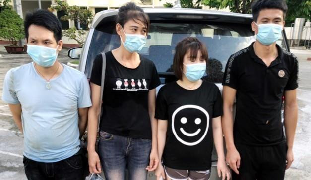 Bốn đối tượng nhập cảnh trái phép bị lực lượng Biên phòng Hải Hòa, thành phố Móng Cái bắt giữ. (Ảnh: TTXVN)