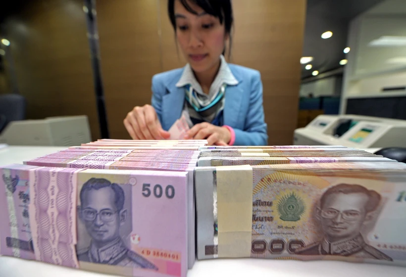 Đồng baht Thái Lan. (Ảnh: AFP/TTXVN)