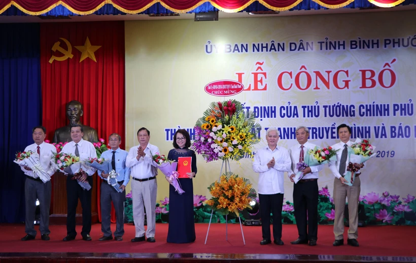 Lễ công bố và ra mắt lãnh đạo Đài Phát thanh - Truyền hình và báo Bình Phước. (Ảnh: Dương Chí Tưởng/TTXVN)