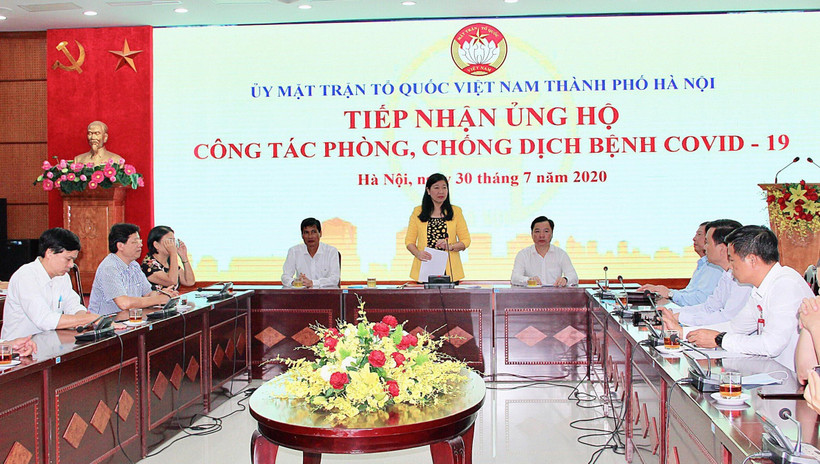 Quang cảnh buổi lễ tiếp nhận nhận ủng hộ phòng, chống dịch COVID-19. (Ảnh: Nguyễn Thắng/TTXVN)