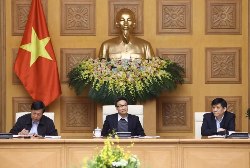Phó Thủ tướng Vũ Đức Đam chủ trì cuộc họp. (Ảnh: Văn Điệp/TTXVN)