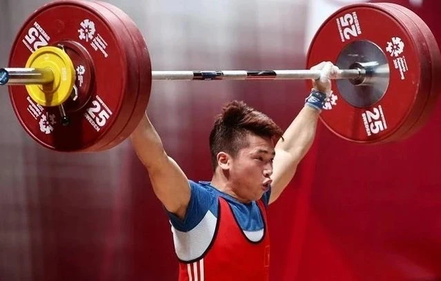 Lực sỹ Trịnh Văn Vinh là người có cơ hội lớn nhất giành vé dự Olympic 2024 cho cử tạ Việt Nam. (Nguồn: Báo Thể thao Văn hóa)