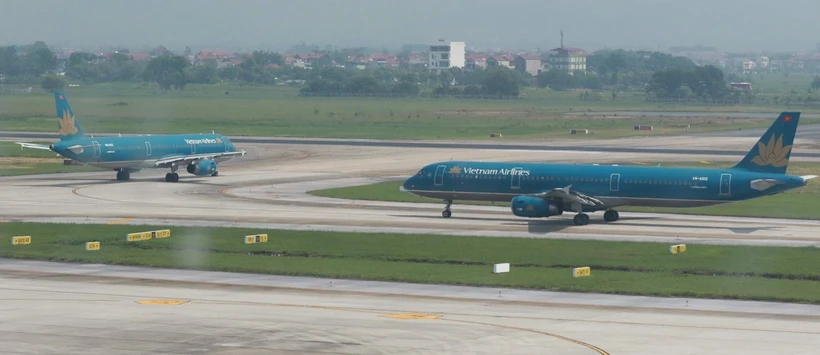 Máy bay của Hãng hàng không Vietnam Airlines tại Sân bay Quốc tế Nội Bài. (Ảnh: Việt Hùng/Vietnam+)