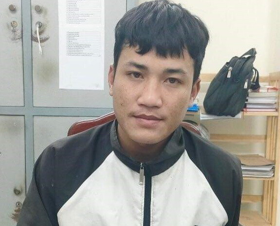 Đối tượng Cadá Tỉnh tại Cơ quan Công an. (Ảnh: TTXVN phát)