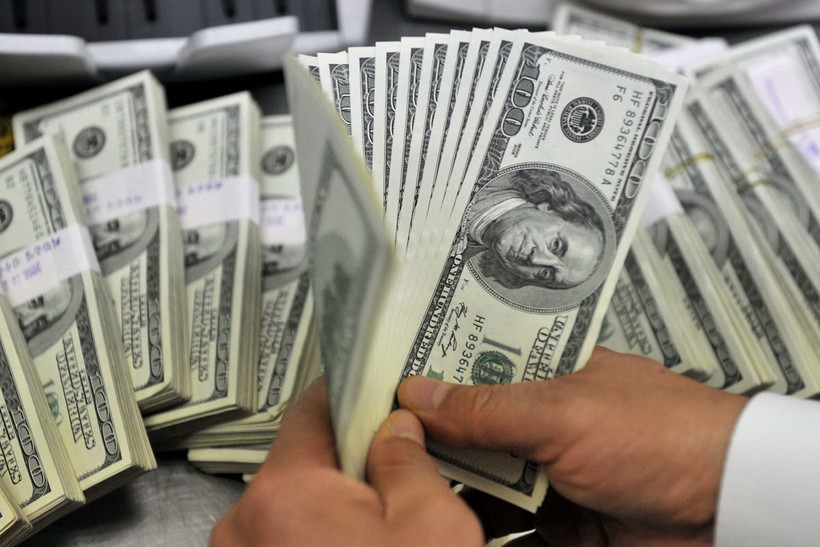 Các nước đang phát triển trên toàn cầu đã chi số tiền kỷ lục 1.400 tỷ USD để trả nợ vào năm ngoái. (Ảnh: AFP/TTXVN)