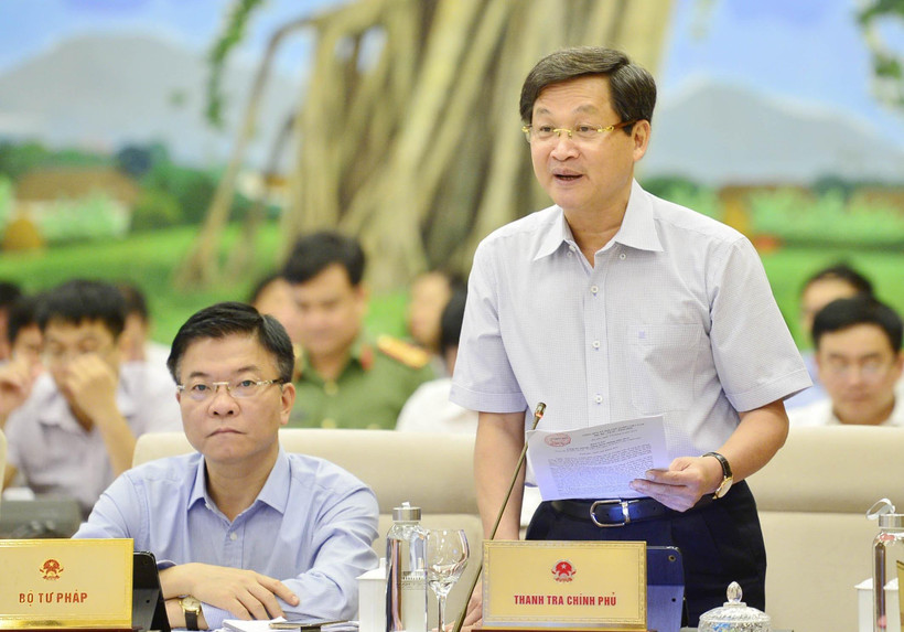 Tổng Thanh tra Chính phủ Lê Minh Khái trình bày báo cáo (tóm tắt) về công tác phòng, chống tham nhũng. (Ảnh: Trọng Đức/TTXVN)