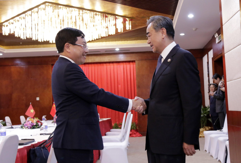 Phó Thủ tướng, Bộ trưởng Phạm Bình Minh và Ngoại trưởng Vương Nghị tại cuộc gặp. (Ảnh: Phạm Kiên/TTXVN)