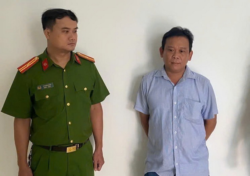 Đối tượng Trần Văn Hoàng Giang tại cơ quan Công an. (Ảnh: TTXVN phát)