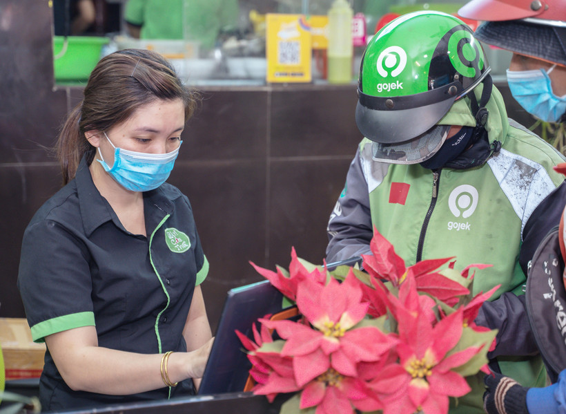GoBiz hỗ trợ các nhà hàng, quán ăn chủ động quản lý đơn hàng GoFood, và hạn chế sai sót về đơn hàng. (Ảnh: T.Uyên/Vietnam+)
