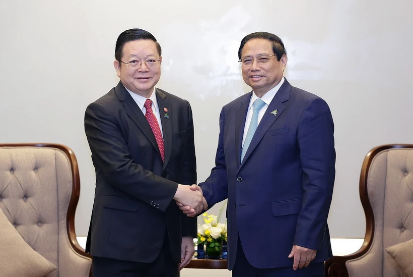 Thủ tướng Phạm Minh Chính tiếp Tổng Thư ký ASEAN Kao Kim Hourn. (Ảnh: Dương Giang/TTXVN)