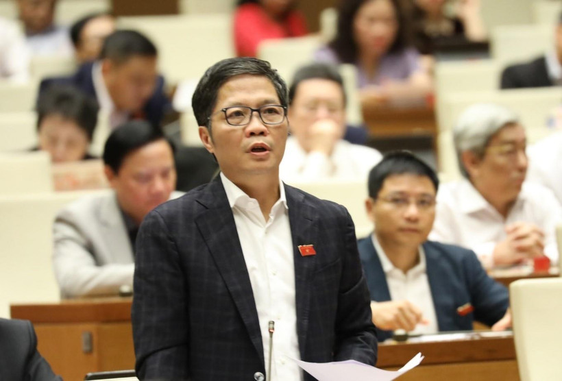 Bộ trưởng Bộ Công Thương Trần Tuấn Anh phát biểu giải trình, làm rõ một số vấn đề đại biểu Quốc hội nêu. (Ảnh: Văn Điệp/TTXVN)