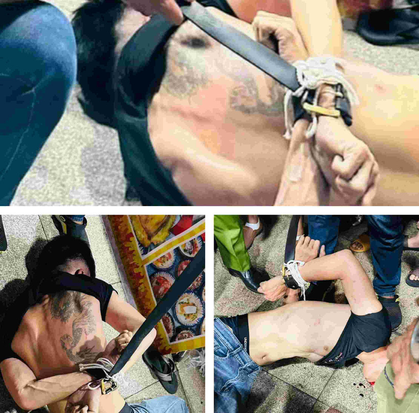 Người dân bắt trói nghi phạm cướp giật dây chuyền. (Ảnh: Báo Lao Động)