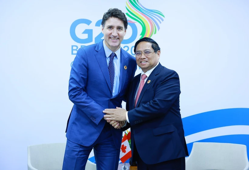 Thủ tướng Phạm Minh Chính gặp Thủ tướng Canada Justin Trudeau. (Ảnh: Dương Giang/TTXVN)