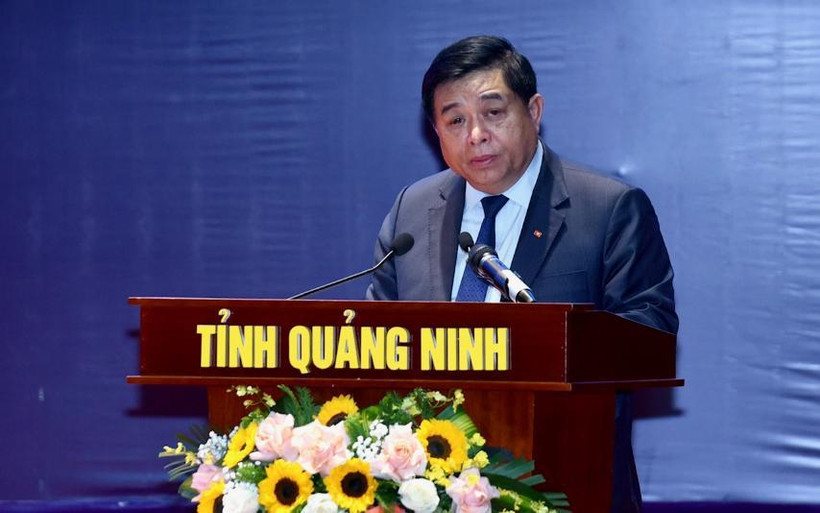 Bộ Trưởng Bộ Kế hoạch và Đầu tư Nguyễn Chí Dũng công bố Nghị quyết số 14 /NQ-CP. (Ảnh: Vietnam+)