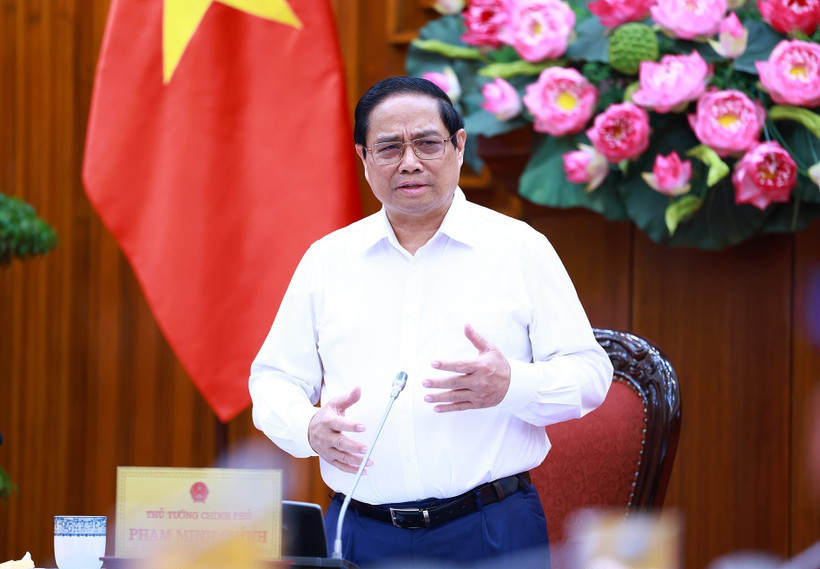 Thủ tướng Phạm Minh Chính kết luận buổi làm việc với các đơn vị để đẩy nhanh tiến độ hoàn thành Dự án đường dây 500kV mạch 3. (Ảnh: Dương Giang/TTXVN)