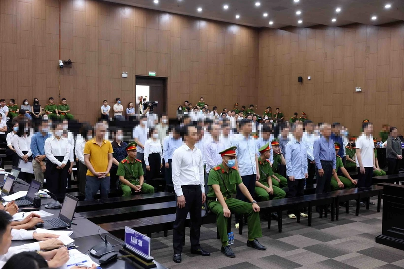 Các bị cáo tại phiên xét xử ngày 22/7. (Ảnh: Phạm Kiên/TTXVN)