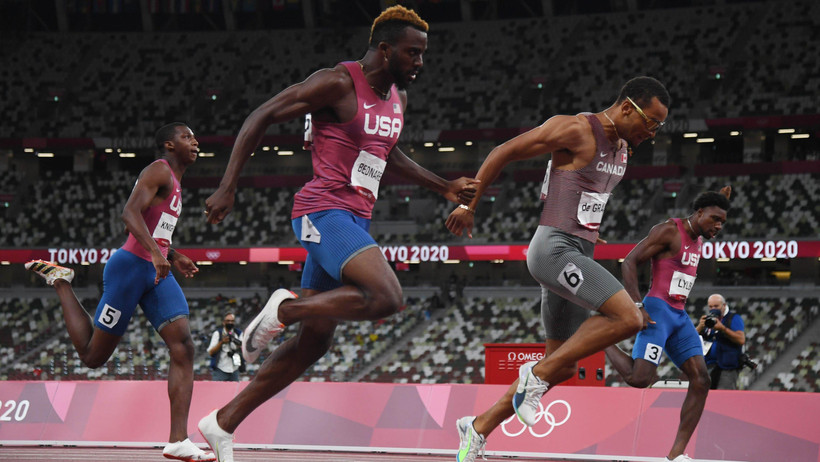 3 vận động viên Mỹ về sau đối thủ người Canada ở nội dung chạy 200m nam. (Nguồn: ustoday)