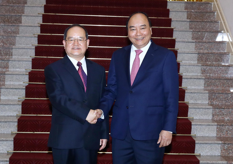 Thủ tướng Nguyễn Xuân Phúc tiếp đồng chí Lộc Tâm Xã, Bí thư Khu ủy Khu tự trị dân tộc Choang Quảng Tây (Trung Quốc). (Ảnh: Thống Nhất/TTXVN)
