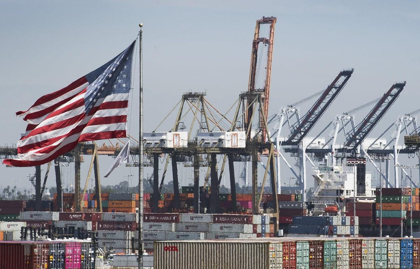 Cuộc chiến thương mại Mỹ-Trung ảnh hưởng đến tăng trưởng kinh tế toàn cầu. (Ảnh: AFP/TTXVN)