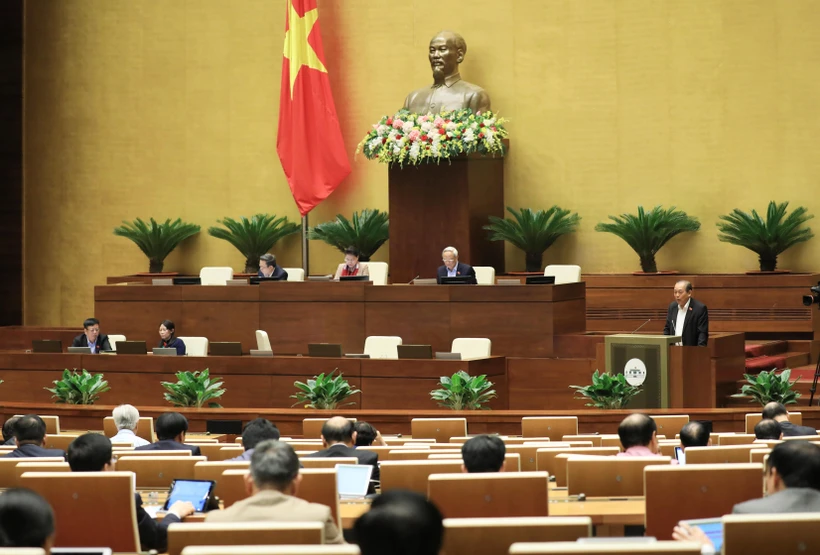 Phó Thủ tướng Thường trực Trương Hòa Bình tình bày báo cáo của Chính phủ về công tác phòng ngừa, chống tội phạm và vi phạm pháp luật; công tác thi hành án và công tác phòng, chống tham nhũng năm 2020. (Ảnh: Lâm Khánh/TTXVN)