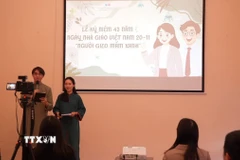 Lễ kỷ niệm 43 năm Ngày Nhà giáo Việt Nam do Hội sinh viên Việt Nam tại Nga tổ chức. (Ảnh: Trần Hải/TTXVN)