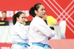 Đội tuyển Karate Việt Nam thi đấu nội dung Kata đồng đội nữ. (Ảnh: TTXVN phát)