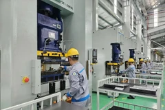 Hệ thống dây chuyền lắp ráp ôtô của Tập đoàn THACO Trường Hải. (Ảnh: Kha Phạm/TTXVN)