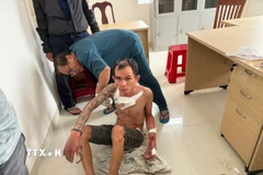 Đối tượng Nguyễn Văn Ty tại cơ quan công an. (Ảnh: TTXVN phát)