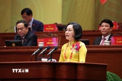 Đồng chí Nguyễn Thị Thanh, Ủy viên Trung ương Đảng, Ủy viên Ban Thường vụ Đảng ủy Quốc hội, Phó Chủ tịch Quốc hội, tham luận về vấn đề “Nâng cao tính Đảng, tính Nhân dân trong hoạt động của Quốc hội đáp ứng yêu cầu hoàn thiện thể chế phát triển đất nước trong kỷ nguyên mới.” (Ảnh: TTXVN)