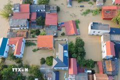 Nước nhấn chìm nhiều ngôi nhà tại các tổ dân phố Yên Viên, Vân Hà, Thổ Hà, phường Vân Hà, tỉnh Bắc Ninh. (Ảnh: Phan Phương/TTXVN)
