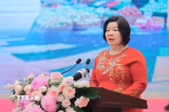 Bà Cao Xuân Thu Vân, Chủ tịch Liên minh Hợp tác xã Việt Nam, Phó Trưởng ban chỉ đạo Quốc gia về kinh tế tập thể phát biểu. (Ảnh: Lê Đông/TTXVN)