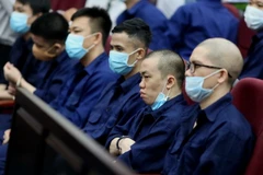 Các bị cáo tại phiên tòa phúc thẩm. (Ảnh: Thành Chung/TTXVN)