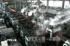 Ảnh minh họa dây chuyền sản xuất thép. (Ảnh: Huy Hùng/TTXVN)