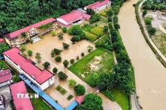 Mưa lớn gây ngập úng khu vực trung tâm xã Lâm Bình, tỉnh Tuyên Quang. (Ảnh: TTXVN phát)