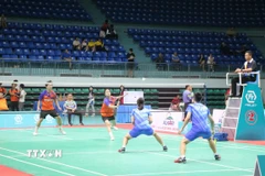 Các tay vợt tranh tài ở các trận vòng loại. (Ảnh: Thái Hùng/TTXVN)