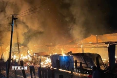 Hiện trường 1 vụ cháy nhà dân ngày 9/8 tại Quảng Ngãi. (Ảnh: TTXVN phát)