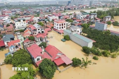 Nhiều khu vực của Bắc Ninh bị nước lũ bủa vây. (Ảnh: Thanh Thương/TTXVN)