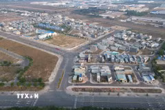 Hàng loạt gia đình đã xây nhà, ổn định cuộc sống tại Khu tái định cư Lộc An-Bình Sơn (thành phố Đồng Nai). (Ảnh: Công Phong/TTXVN)