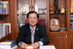 Luật sư Nguyễn Văn Hậu, Chủ nhiệm Cơ quan truyền thông Liên đoàn Luật sư Việt Nam, góp ý cho dự thảo văn kiện. (Ảnh: Xuân Khu/TTXVN)