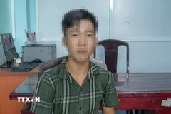 Đối tượng Nguyễn Bé Thành tại cơ quan Công an. (Ảnh: TTXVN phát) 