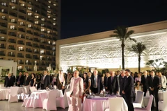 Bạn bè quốc tế và đông đảo kiều bào Việt Nam đang sinh sống và công tác tại Ai Cập dự lễ kỷ niệm. (Ảnh: Nguyễn Trường/TTXVN