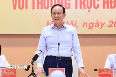Chủ tịch Hội đồng Nhân dân thành phố Hà Nội, Phó Trưởng đoàn Đại biểu Quốc hội thành phố Hà Nội Nguyễn Ngọc Tuấn phát biểu tại hội nghị giao ban với Thường trực Hội đồng Nhân dân quận, huyện, thị xã. (Ảnh: TTXVN phát)