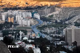 Syria đã triển khai đạt yêu cầu các cam kết liên quan đến bảo đảm tính bền vững của nợ công, tăng cường quản lý nợ và nâng cao tính minh bạch trong quản lý tài chính công. (Trong ảnh: Thủ đô của Syria. Ảnh: THX/TTXVN)