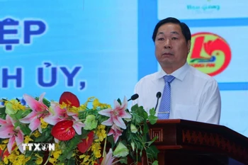 Ông Lâm Hoàng Nghiệp, Phó Chủ tịch Ủy ban Nhân dân tỉnh Sóc Trăng, phát biểu tại Hội nghị. (Ảnh: Tuấn Phi/TTXVN)