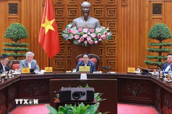 Thủ tướng Phạm Minh Chính chủ trì Phiên họp lần thứ 7 BCĐ tinh gọn bộ máy của Chính phủ. (Ảnh: Dương Giang/TTXVN)