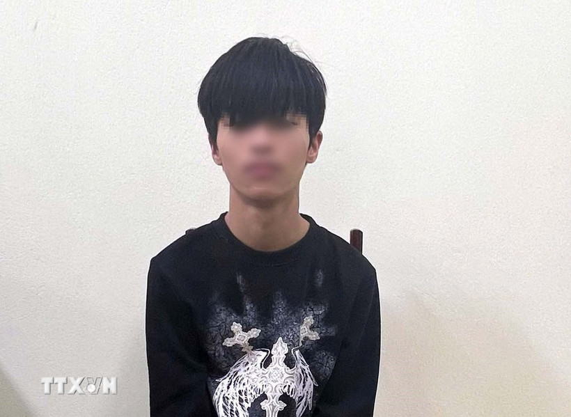 Đối tượng Ng.Ch.Th. T tại cơ quan điều tra. (Ảnh: TTXVN phát)