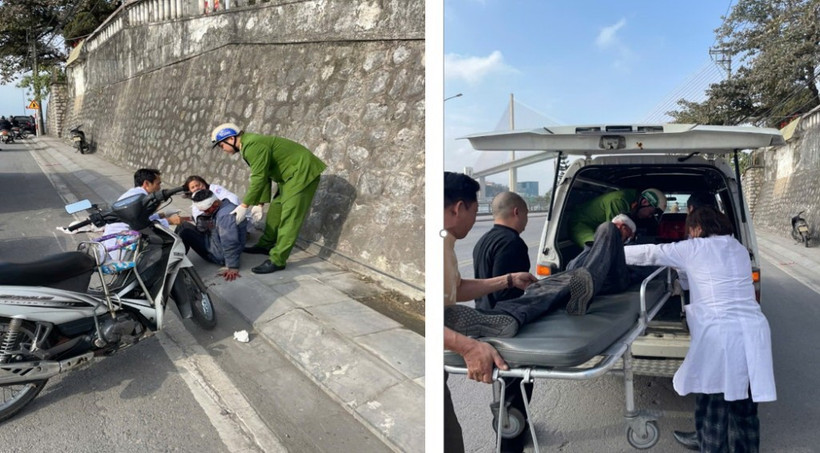 Đại úy Đoàn Việt Dũng khẩn trương sơ cứu và hỗ trợ đưa nạn nhân lên xe cứu thương đi cấp cứu. (Nguồn: báo Quảng Ninh)