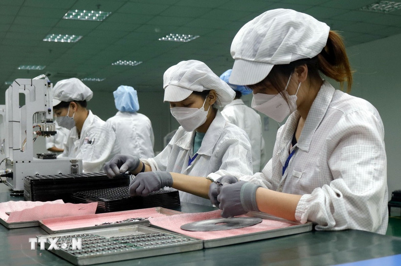 Lao động làm việc trong khu nghiệp ở tỉnh. (Ảnh: Đồng Thúy/TTXVN)