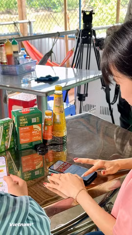 Việc Chính phủ nâng ngưỡng doanh thu miễn thuế lên 1 tỷ đồng/năm giúp nhiều hộ kinh doanh trực tiếp giảm nghĩa vụ thuế và tăng nguồn vốn tái đầu tư. (Ảnh: Vietnam+)