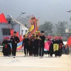 Nghi thức rước lễ của đồng bào dân tộc Tày ở Phong Dụ Thượng. (Ảnh: Đinh Thùy/TTXVN)